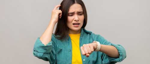 Woman looking at watch